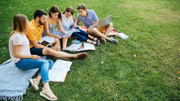 group-of-cheerful-students-teenagers-in-casual-outfits-with-note-books-and-laptop.jpg